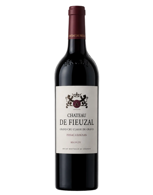 A bottle of Château de Fieuzal red wine on a solid black background.